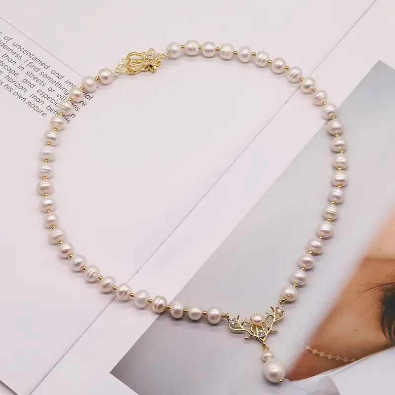 A 100% handmade authentic white freshwater pearl necklace with gold-plated antler pendant, elegant freshwater pearl jewelry, suitable for her holiday gifts, with a gift box for everyday wear, weddings and anniversaries. 【NK-XL2501White-07】