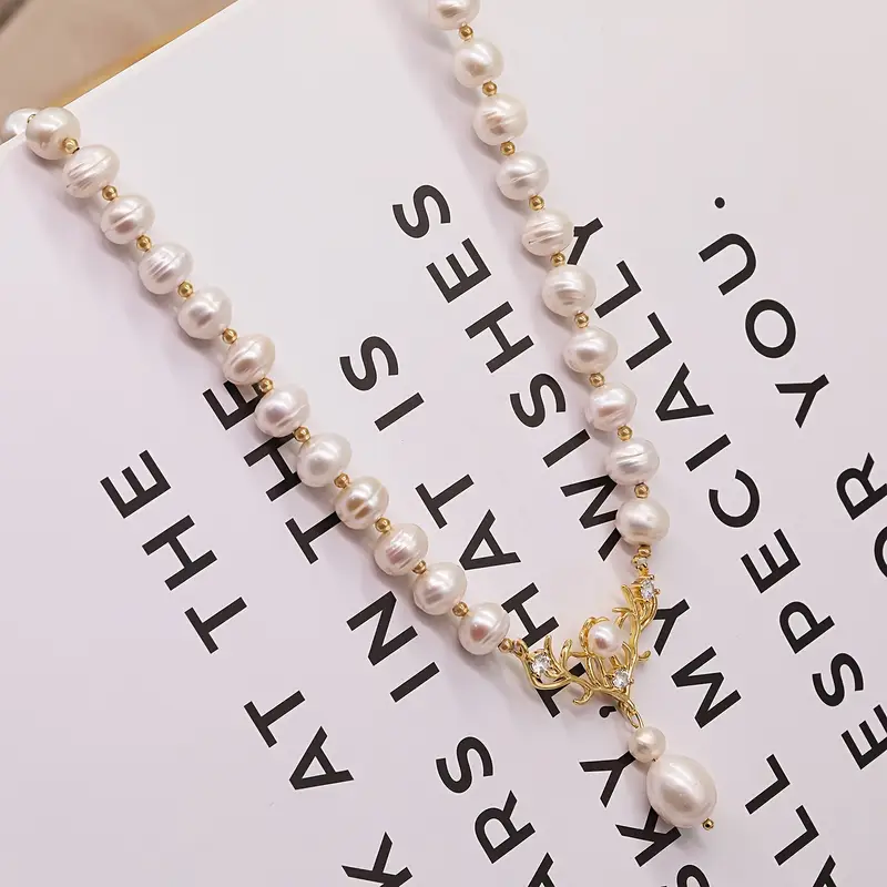 A 100% handmade authentic white freshwater pearl necklace with gold-plated antler pendant, elegant freshwater pearl jewelry, suitable for her holiday gifts, with a gift box for everyday wear, weddings and anniversaries. 【NK-XL2501White-07】