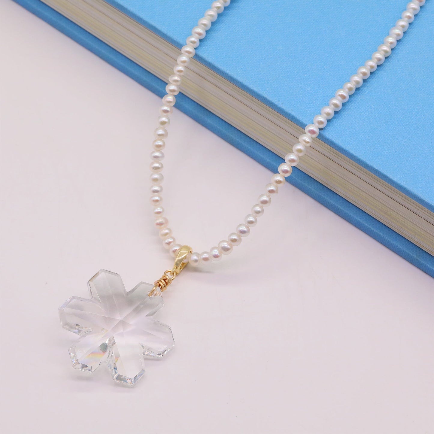 The French elegant 16.93inch long AAA Freshwater Pearl necklace comes with authentic Austrian AAA crystal pendant in the shape of a snowflake, with a gift box, exquisite gift options for everyday, wedding and festive wear