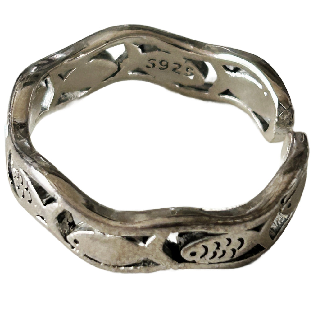 A sterling silver open band ring featuring a carved fish pattern around the exterior, with a 'S925' purity stamp visible on the inner band, set against a plain white background.