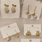 3 dozen assorted style sterling silver earring post dangles, hoops, studs, on cards