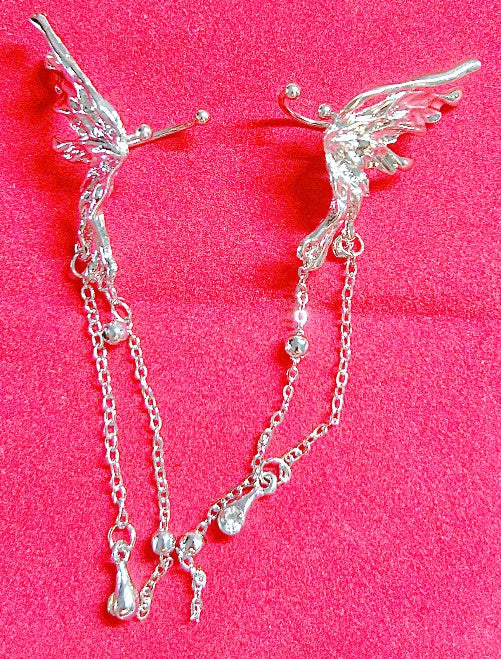 Clip Winged silver dangle earrings