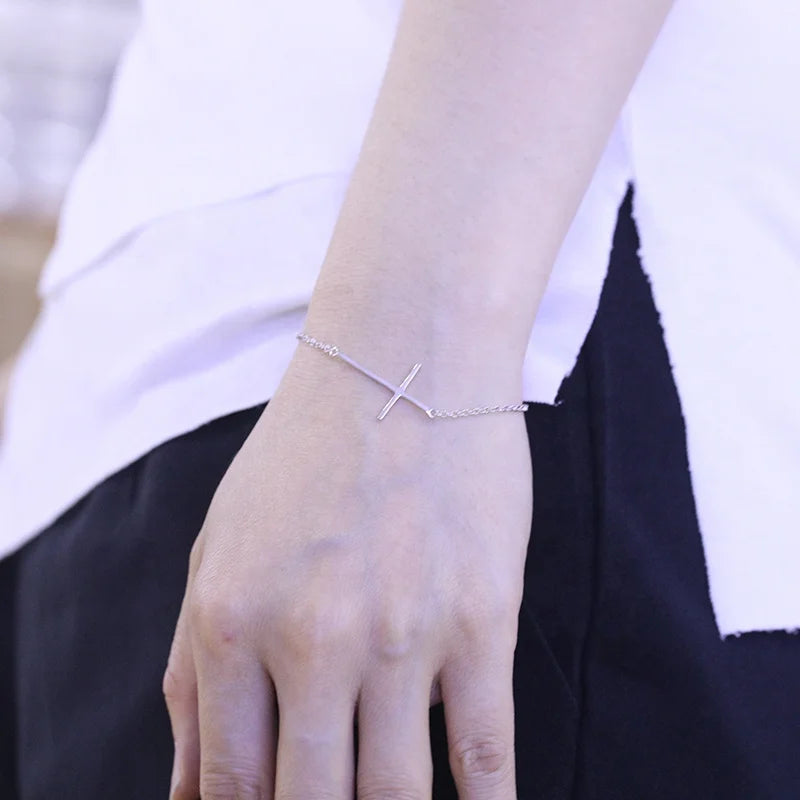 Sideways Sterling silver cross bracelet-warranteed
