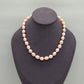 A beautiful 100% handmade, freshwater pearl necklace with golden flower buckle, 10mm, perfect for bridal jewelry, Mother's Day, birthday gifts, parties, giving the perfect ideal gift choice