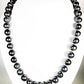 20 inch Elegant black freshwater pearl necklace with cz flower silver clasp