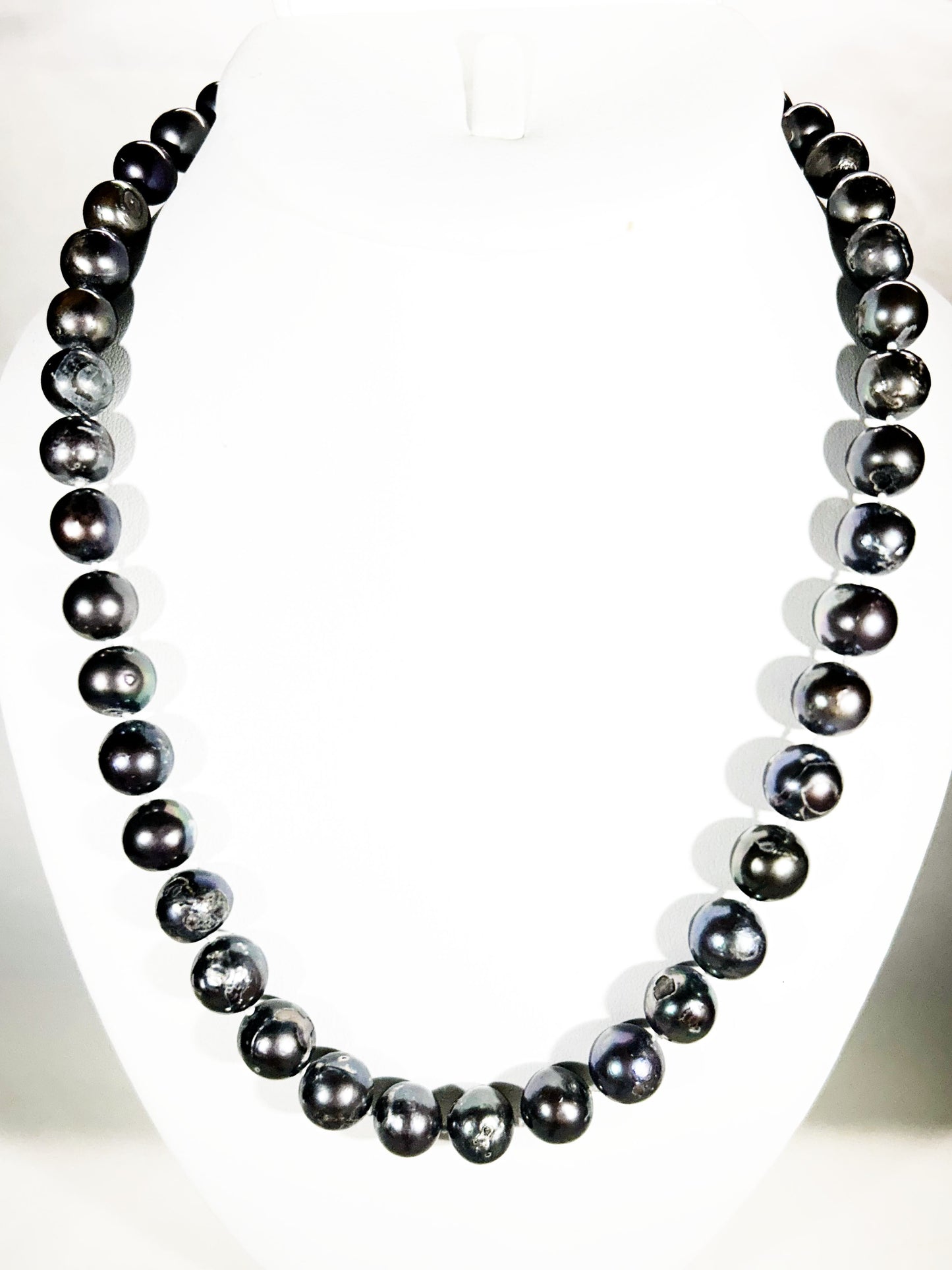 20 inch Elegant black freshwater pearl necklace with cz flower silver clasp