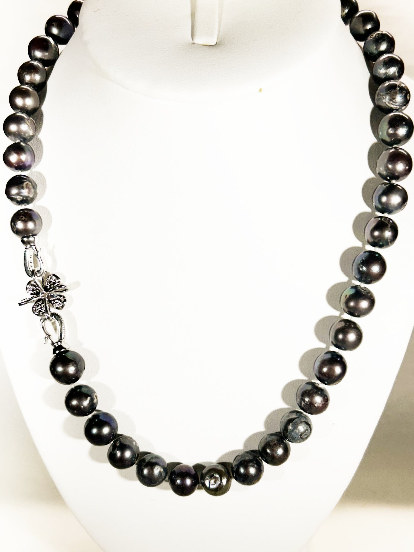 20 inch Elegant black freshwater pearl necklace with cz flower silver clasp