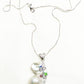 Pearl necklace with a silver chain on a white background