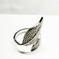 Silver ring with feather design on a white background