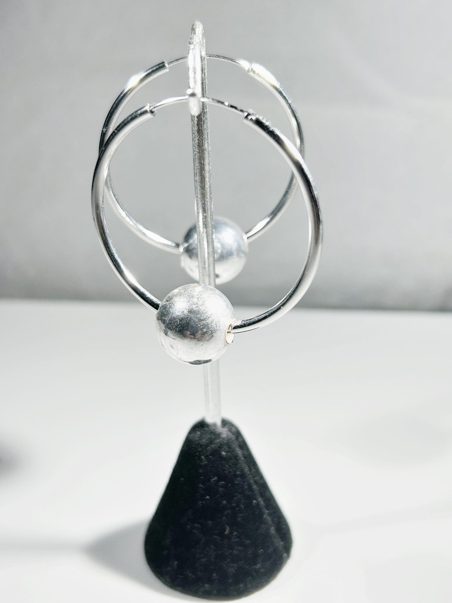 Sterling Silver hoop earring with 13mm floating ball