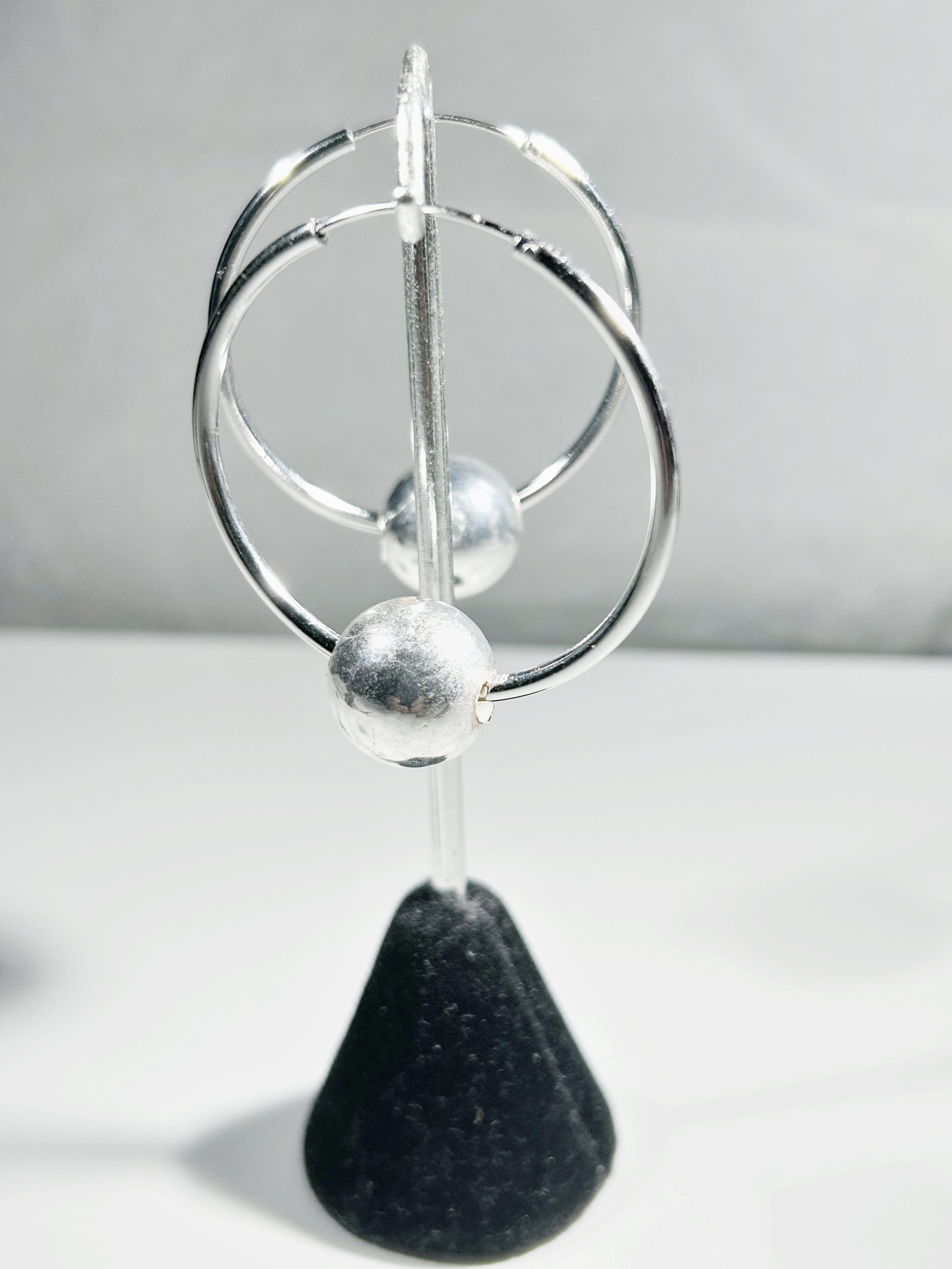 Sterling Silver hoop earring with 13mm floating ball