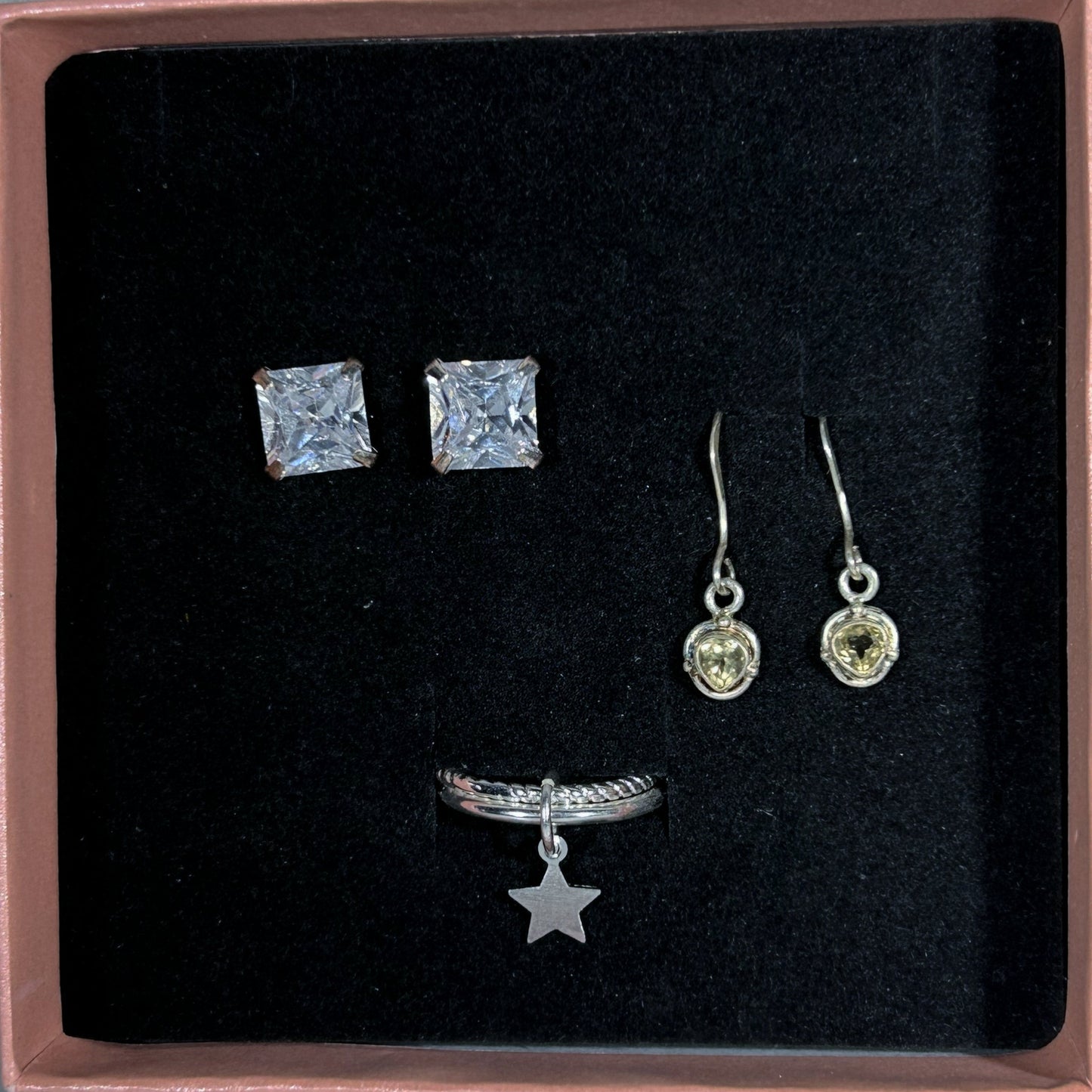 Jewelry set with earrings and a necklace in a box