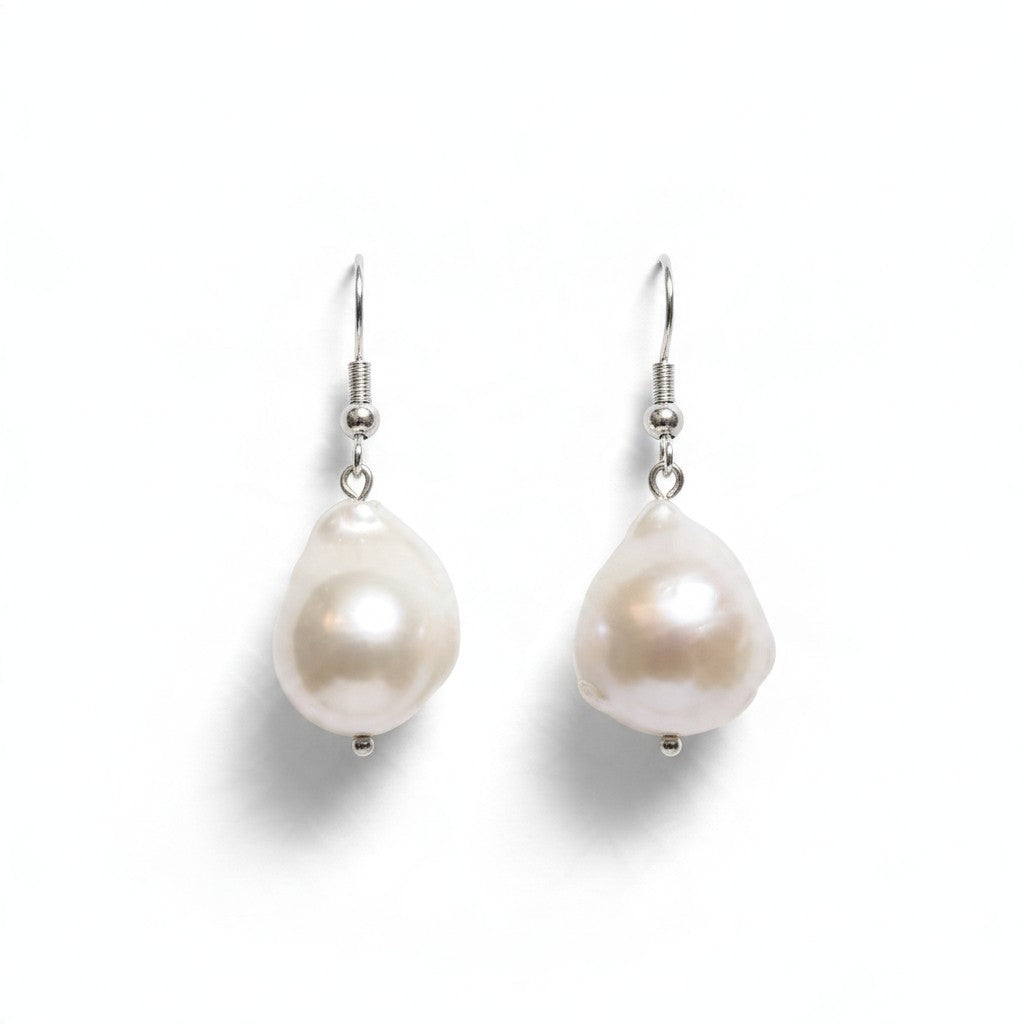 Providence Wholesale Silver baroque pearl drop earrings with iridescent organic pearls on silver-tone hooks.
