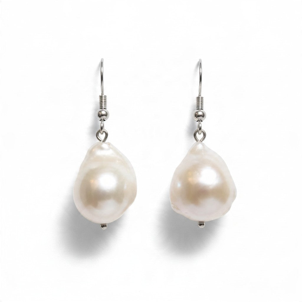 Providence Wholesale Silver baroque pearl drop earrings with iridescent organic pearls on silver-tone hooks.