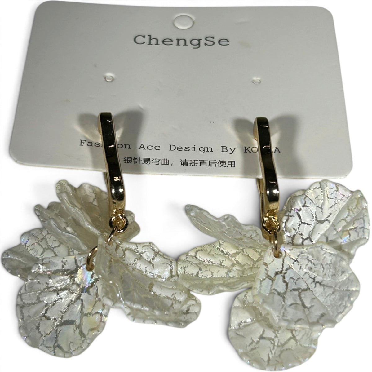 Providence Wholesale Silver floral petal drop hoop earrings with textured translucent white charms on gold hoops.