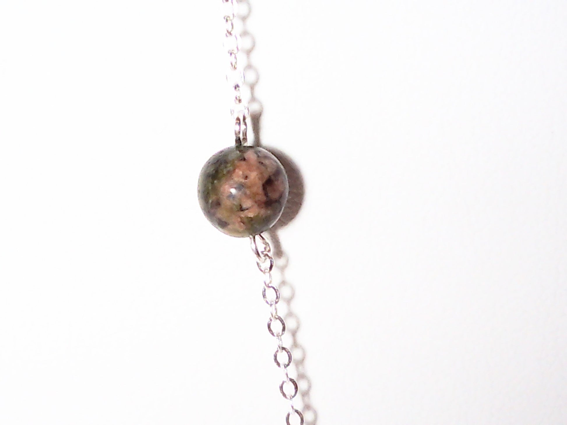 Genuine turquoise and Kambra jasper stone necklace made with sterling silver chain 36 inches.