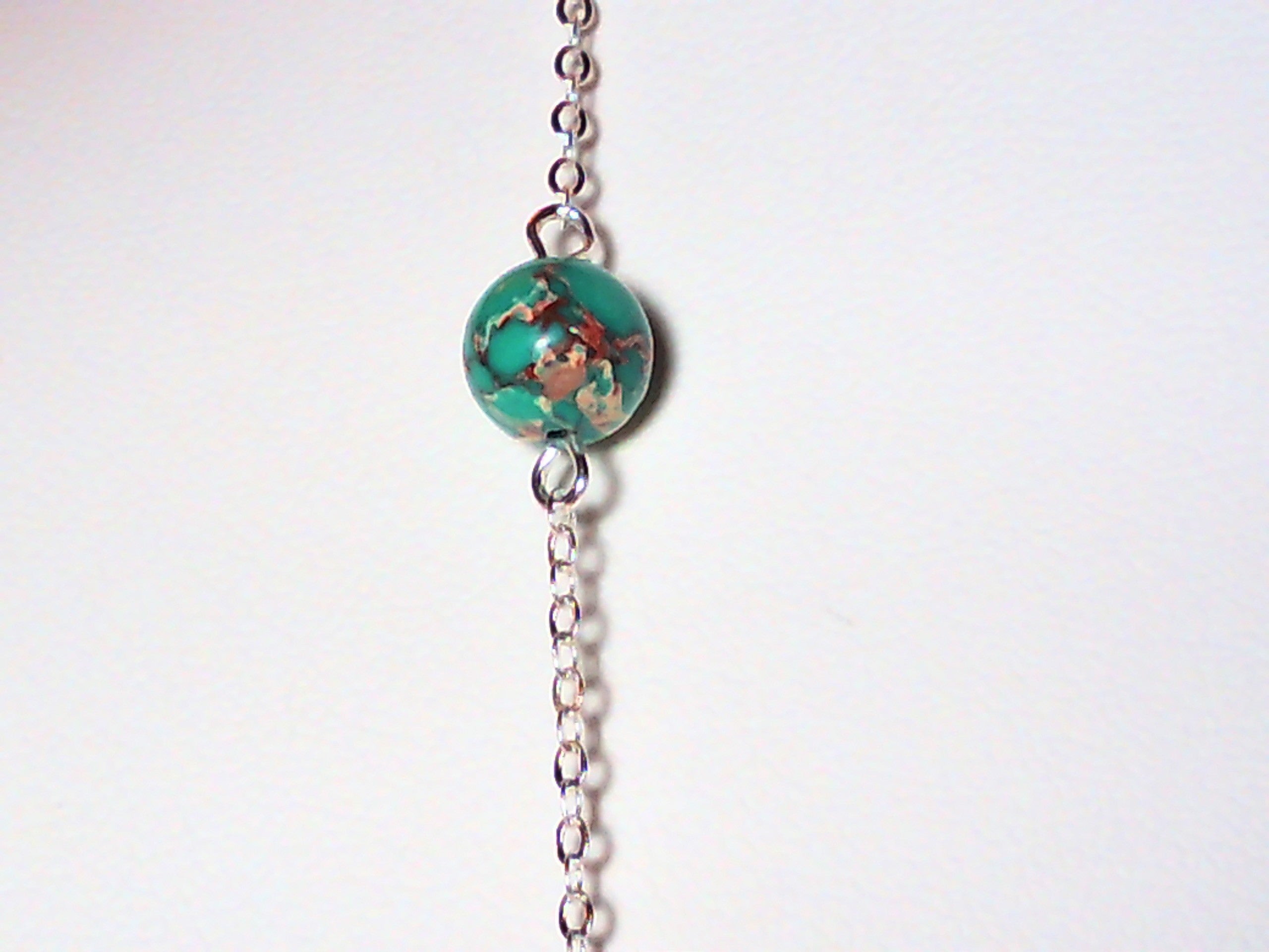 Genuine turquoise and Kambra jasper stone necklace made with sterling silver chain 36 inches.