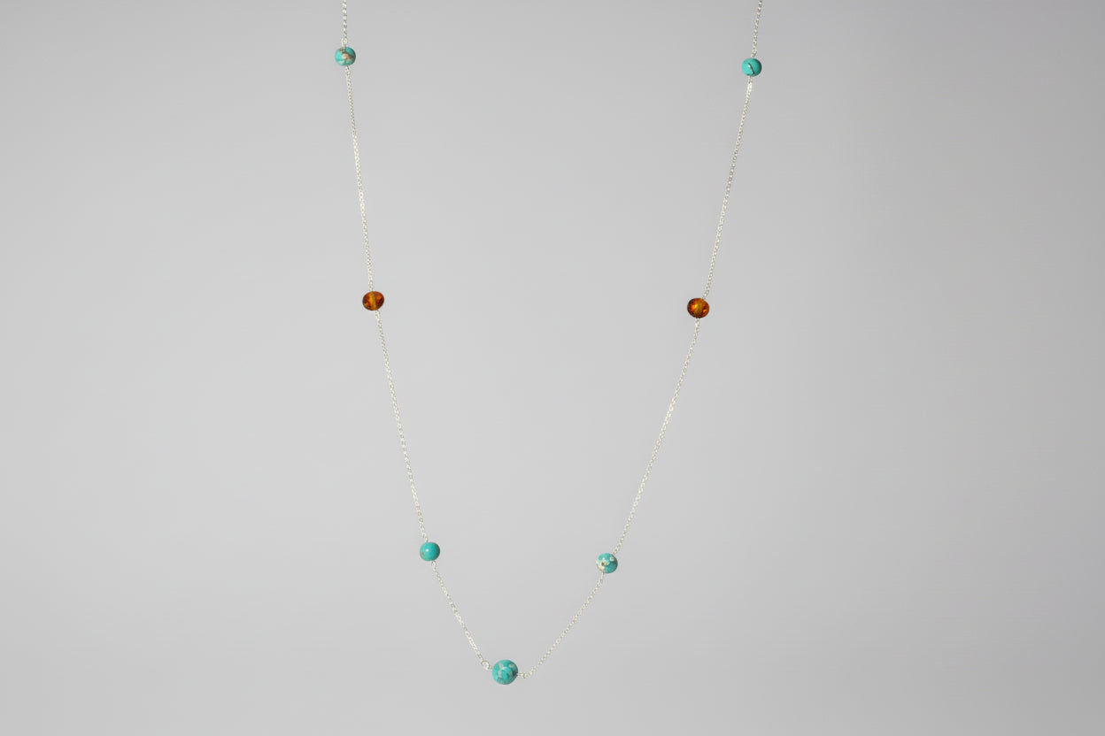 Genuine turquoise and Kambra jasper stone necklace made with sterling silver chain 36 inches.