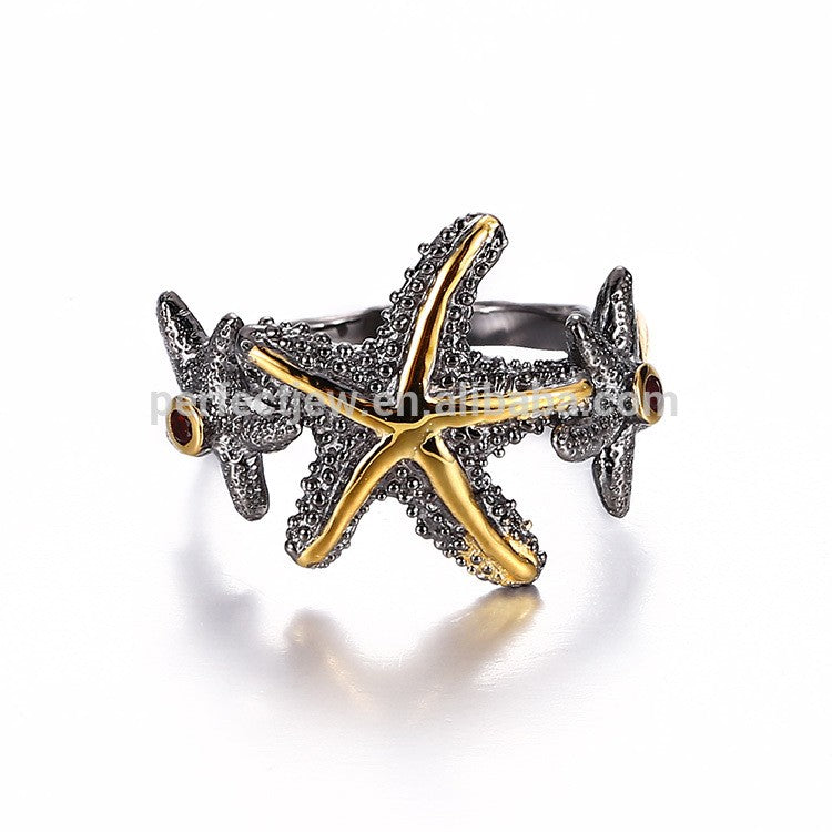 Starfish ring with 2  garnet stones