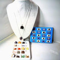 20 interchangeable semi-precious stones plus 2 sterling silver neck chain sizes