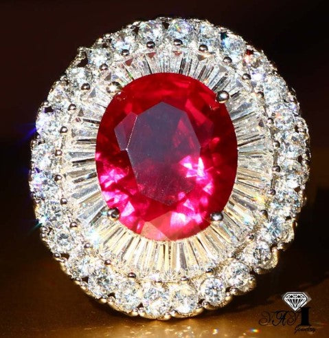 Sterling silver 925 ring with ruby center stone, baguette stones and round cubic