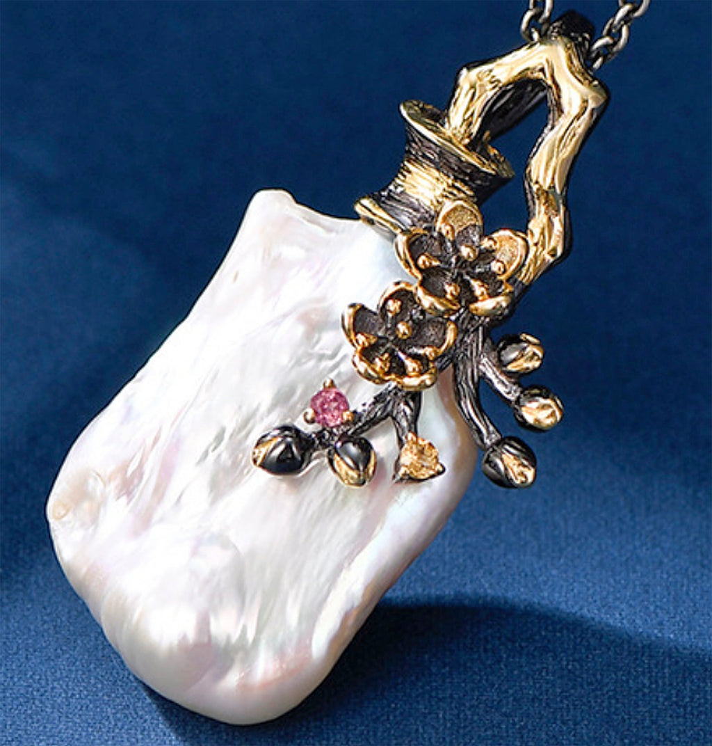 Designer style with Natural Baroque Pearl pendant set in Sterling Silver