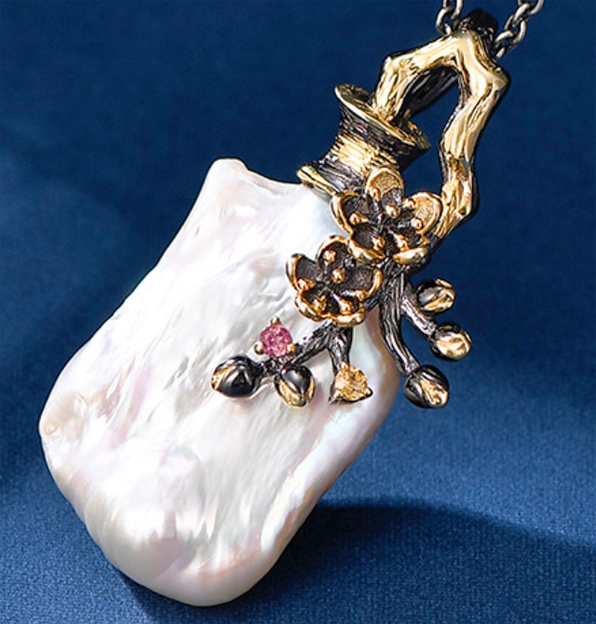 Designer style with Natural Baroque Pearl pendant set in Sterling Silver