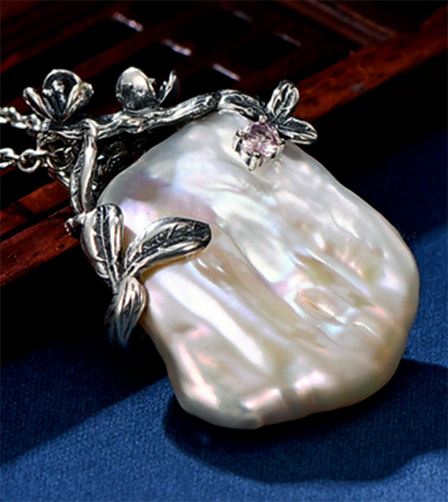 Designer styling with Natural Baroque Pearl pendant set in Sterling Silver