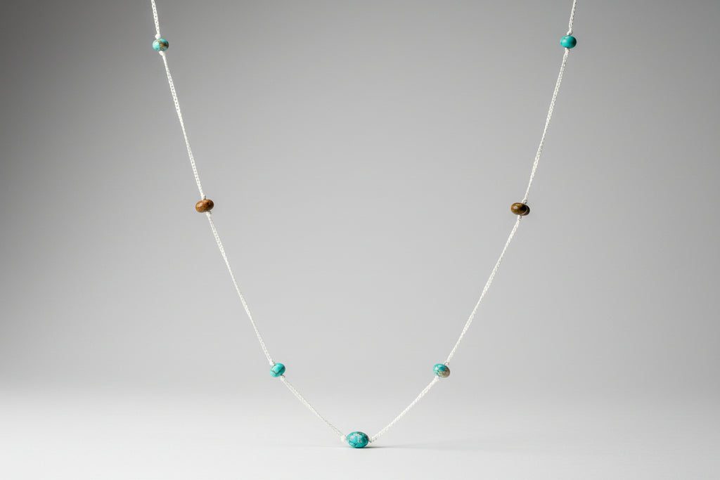 Genuine turquoise and Kambra jasper stone necklace made with sterling silver chain 36 inches.