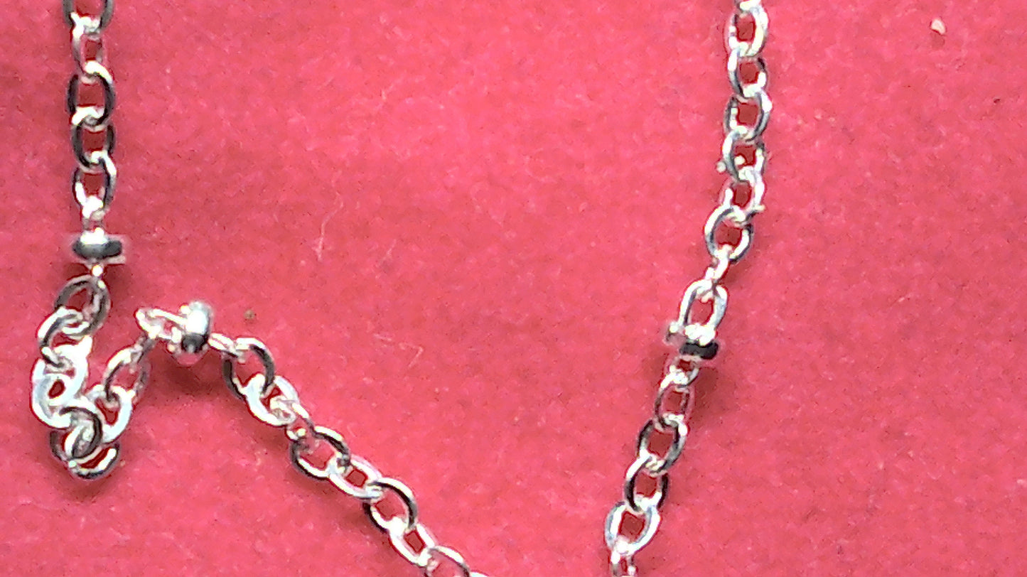 Sterling silver starfish pendant with a fancy cable and ball chain.