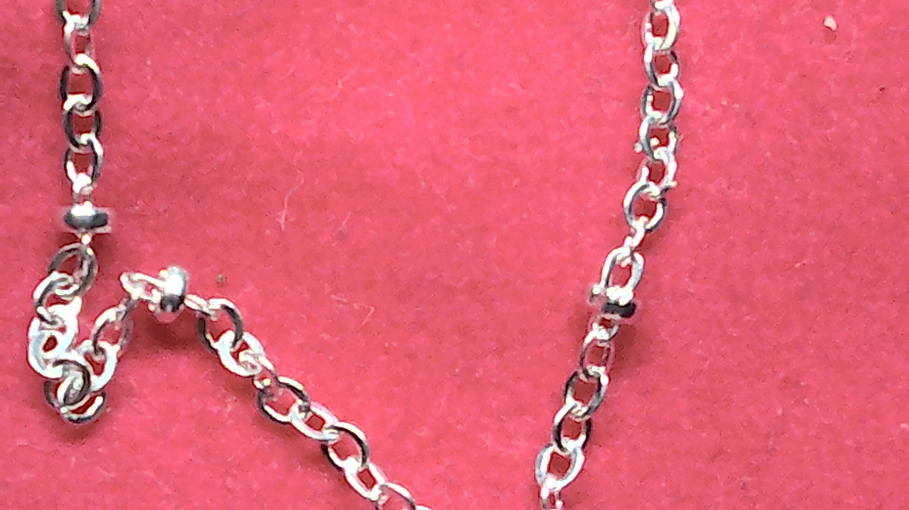 Sterling silver starfish pendant with a fancy cable and ball chain.