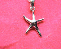 Sterling silver starfish pendant with a fancy cable and ball chain.