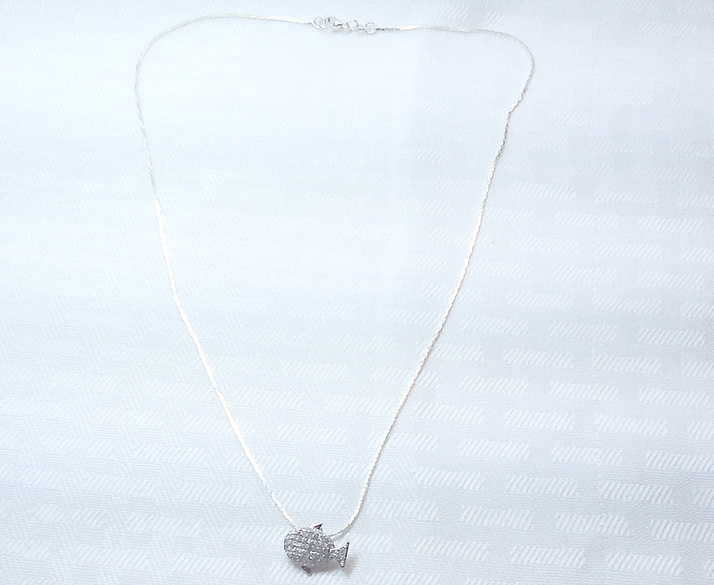 Sterling silver fish pendant with cubic zirconia stones