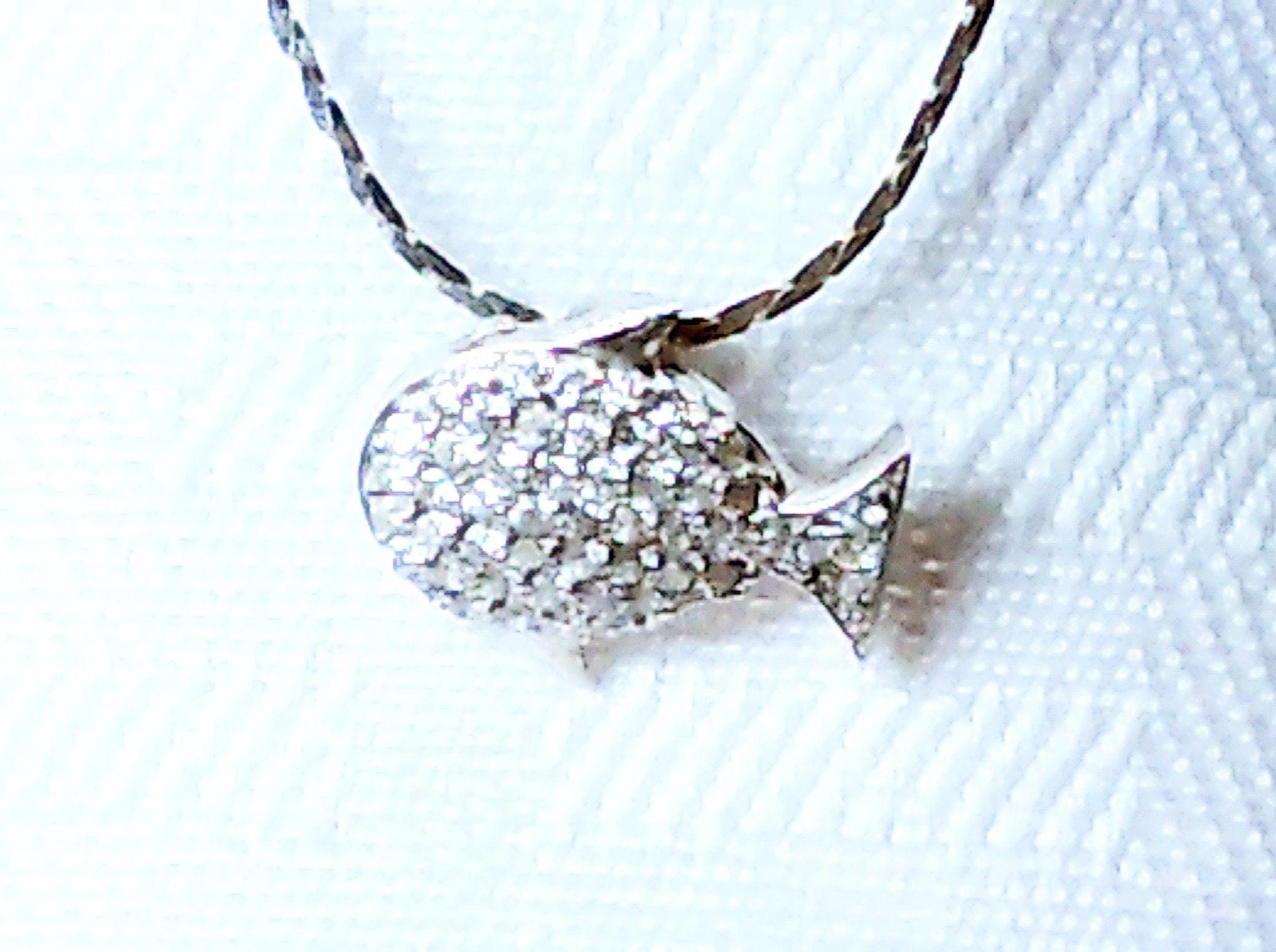 Sterling silver fish pendant with cubic zirconia stones