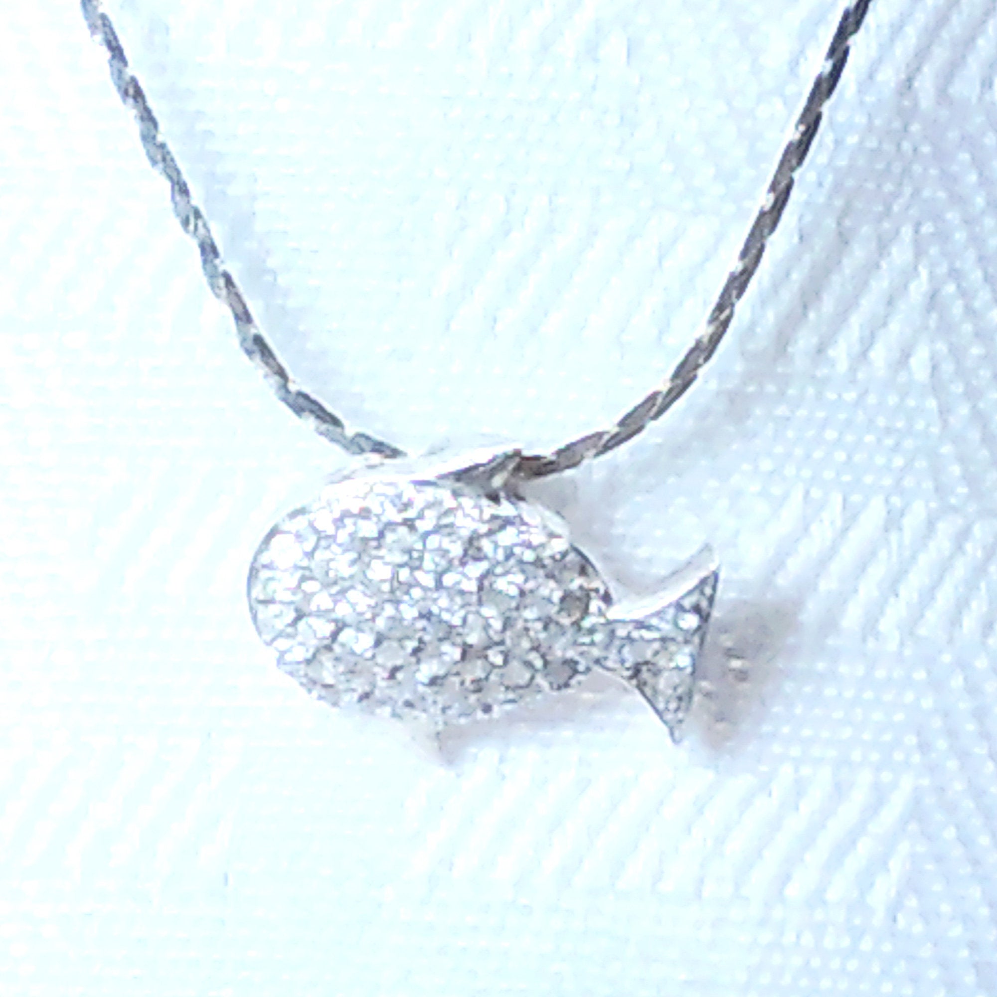 Sterling silver fish pendant with cubic zirconia stones