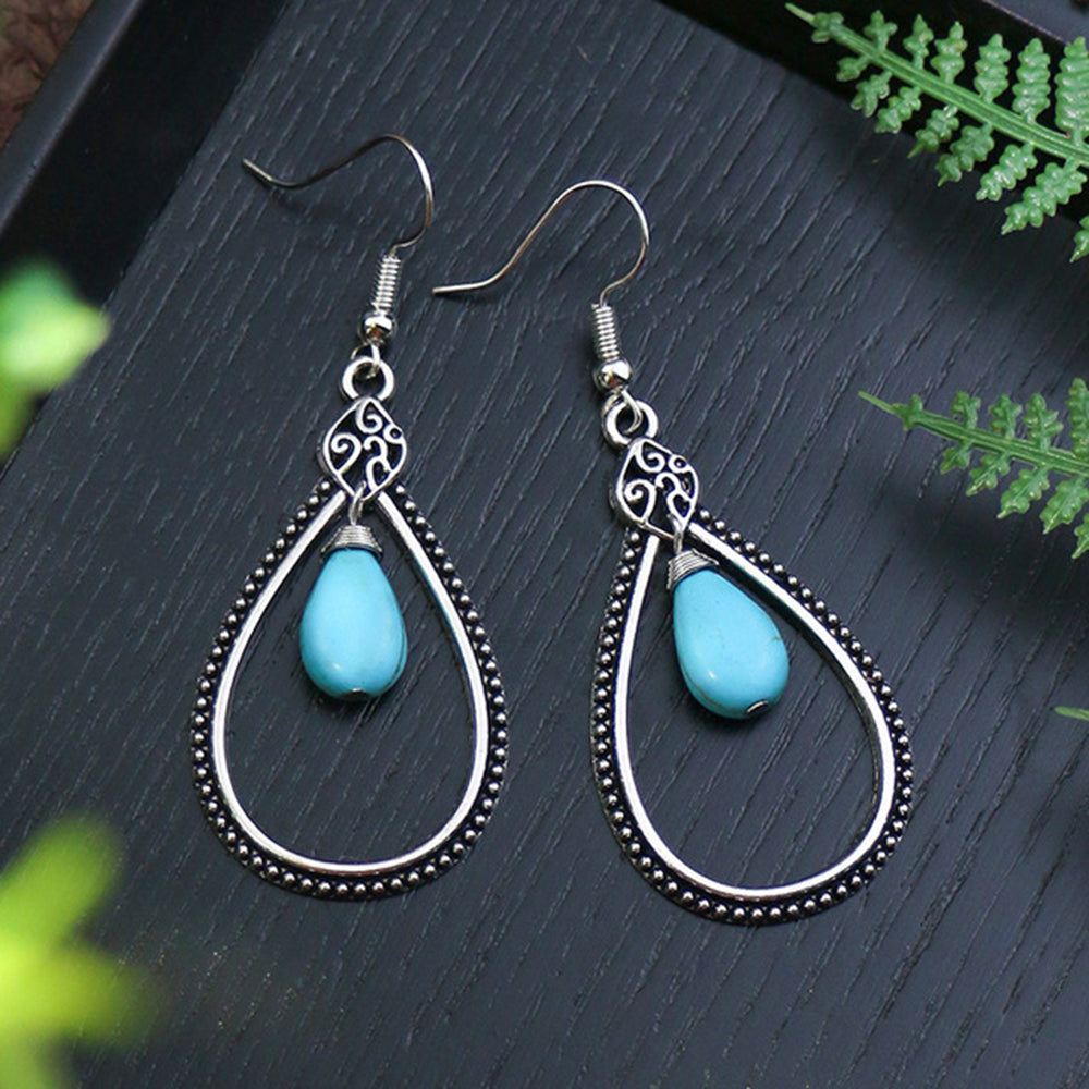 Modern silver finish and turquoise drop earring